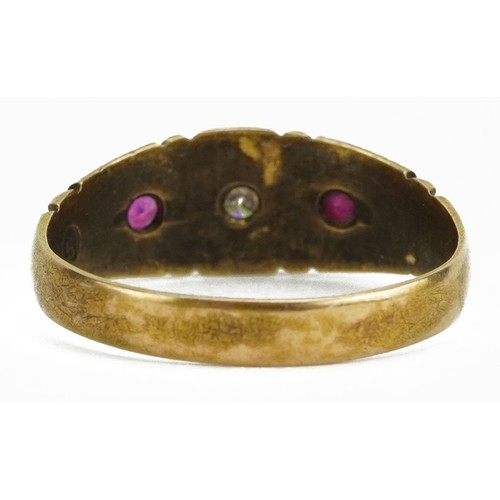 2064 - Victorian 15ct gold ruby and diamond three stone ring housed in a tooled leather box, the diamond ap... 