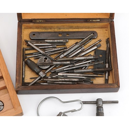 585 - Bergeon, vintage tap and die stock set with handle and a collection of other loose taps and dies