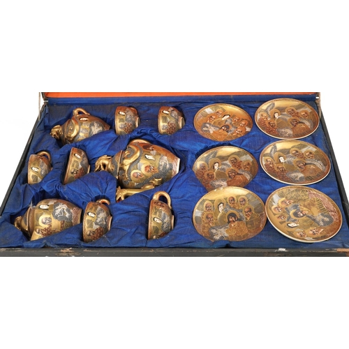 265 - Japanese Satsuma pottery six place tea service hand painted with Geishas and immortals, housed in a ... 