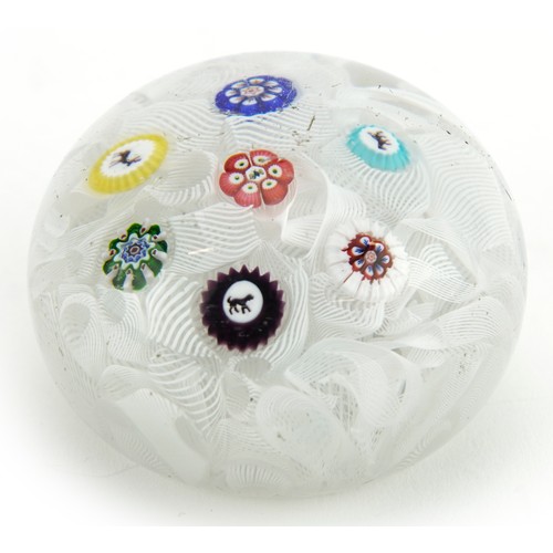 188 - 19th century millefiori glass paperweight with animal canes, possibly Baccarat, 5.5cm in diameter