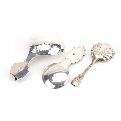 408 - Three decorative arts caddy spoons including one with planished bowl in the style of Georg Jensen, t... 