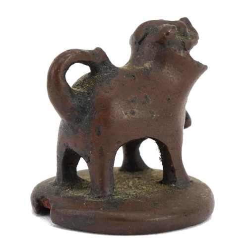 75 - Antique Chinese patinated bronze seal in the form of a mythical animal, 2.5cm high