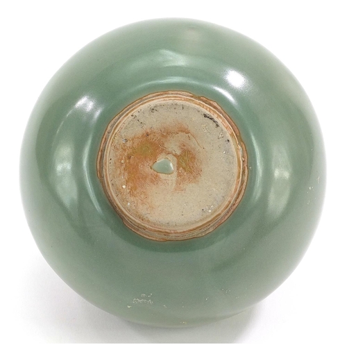 195 - Chinese porcelain three handled jar having a celadon glaze, 10cm high