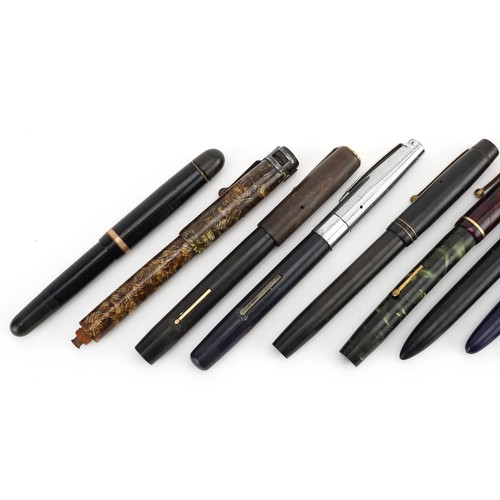 212 - Nine vintage fountain pens, some with gold nibs, including Parker and Conway Steward