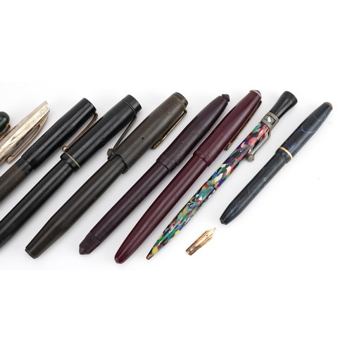 213 - Vintage and later fountain pens and propelling pencils, some with gold nibs, including Parker and Co... 