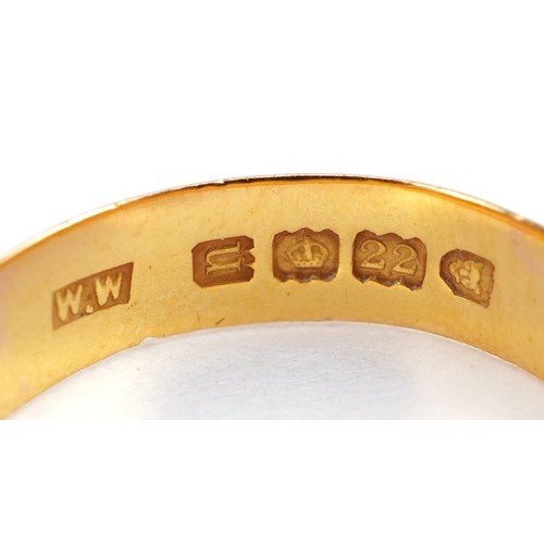 2119 - 22ct gold wedding band, size P, 3.0g together with a silver wdding band with engraved decoration, si... 