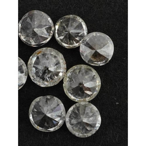 2114 - Twelve loose solitaire diamonds, the largest approximately 3.6mm in diameter, total weight approxima... 