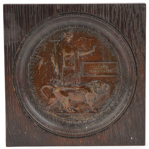 838 - British military World War I death plaque housed in an oak frame awarded to George Freshwater