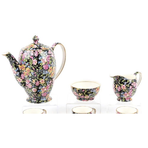 388 - Royal Winton six place chintz coffee service comprising coffee pot, six coffee cans with saucers, mi... 