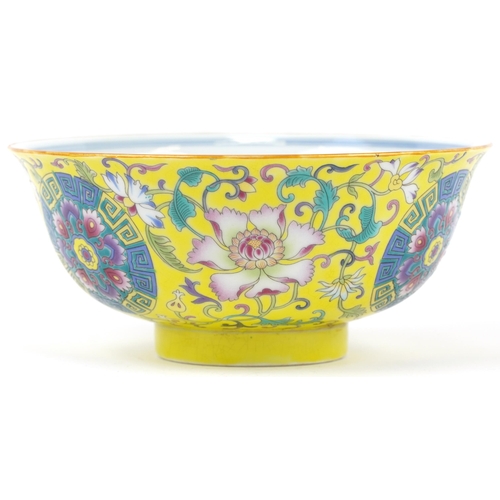 433 - Chinese Tibetan yellow ground porcelain bowl hand painted with Daoist emblems and flowers with calli... 