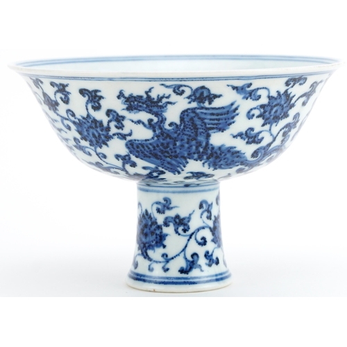 430 - Chinese blue and white porcelain stem bowl hand painted with phoenixes amongst flowers, 10.5cm high ... 