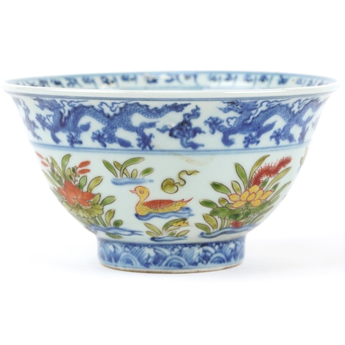 214 - Chinese doucai porcelain bowl hand painted with ducklings in water amongst flowers, six figure chara... 