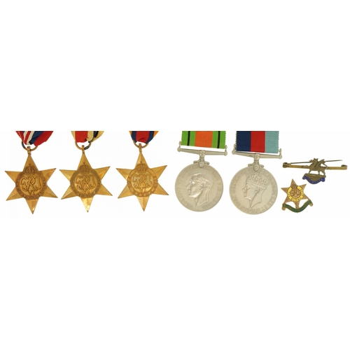 1718 - British military World War II five medal group and two brooches comprising Burma Star Association an... 