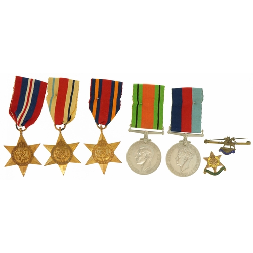 1718 - British military World War II five medal group and two brooches comprising Burma Star Association an... 