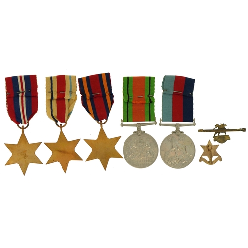 1718 - British military World War II five medal group and two brooches comprising Burma Star Association an... 