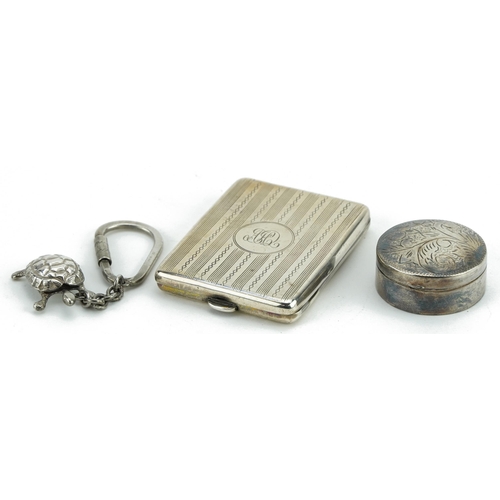 423 - Silver objects comprising rectangular match case, circular pillbox with hinged lid and a tortoise ke... 