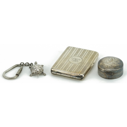 423 - Silver objects comprising rectangular match case, circular pillbox with hinged lid and a tortoise ke... 