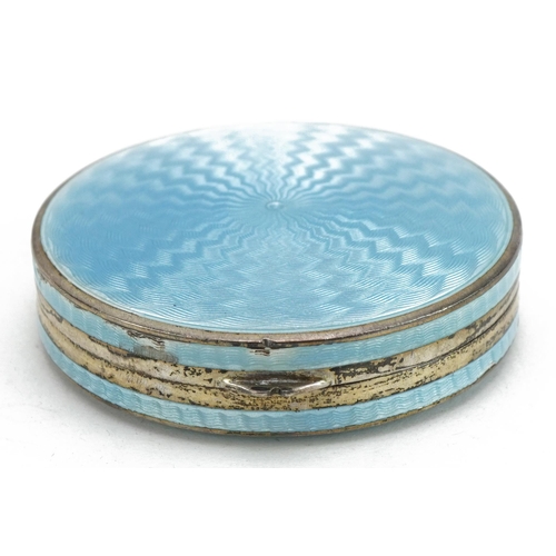 82 - P H Vogel & Co, Art Deco silver and blue guilloche enamelled compact with hinged lid and gilt interi... 