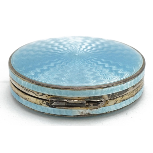 82 - P H Vogel & Co, Art Deco silver and blue guilloche enamelled compact with hinged lid and gilt interi... 