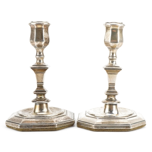 73 - Hawksworth, Eyre & Co Ltd, pair of George V octagonal silver candlesticks, Sheffield 1921, 16cm high... 