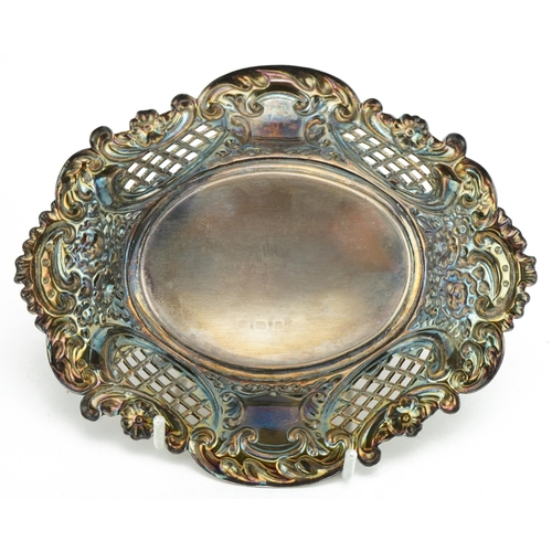 370 - William Adams Ltd, Elizabeth II silver bonbon dish pierced and embossed with flowers and foliage wit... 