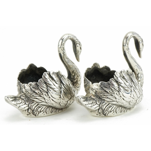 29 - George Stockwell, pair of George V novelty silver swan table salts, import marks for London 1928, 5.... 
