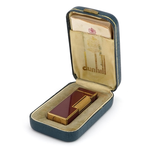 354 - Dunhill gold plated and red enamel pocket lighter with box