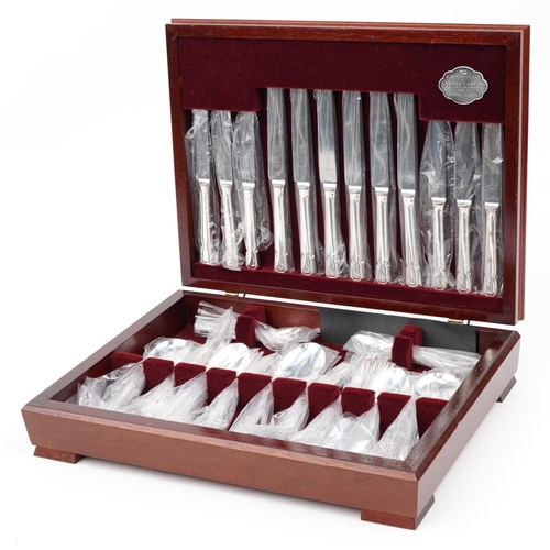 1086 - Six place canteen of Cooper Ludman Sheffield silver plated cutlery, the canteen 40.5cm wide