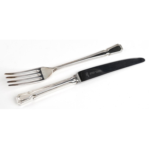 1086 - Six place canteen of Cooper Ludman Sheffield silver plated cutlery, the canteen 40.5cm wide