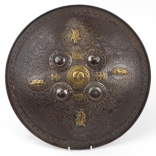 178 - Antique Indian iron Dhal shield with applied brass deities, 44cm in diameter