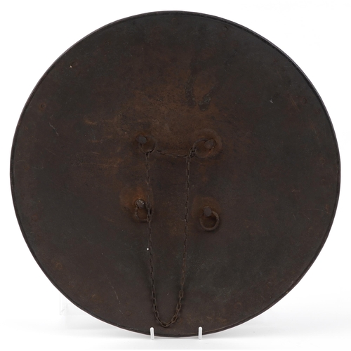 178 - Antique Indian iron Dhal shield with applied brass deities, 44cm in diameter