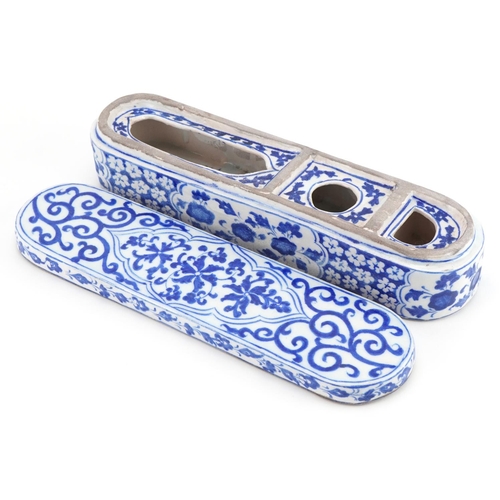 17 - Turkish Ottoman pottery pen box hand painted with stylised flowers, 28.5cm in length