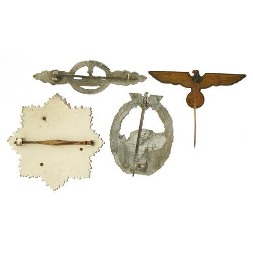 1726 - Three German military interest badges and an eagle stickpin