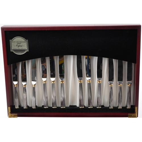 1085 - Guy Degrenne six place mahogany canteen of silver plated cutlery for the Orfevre Collection, the can... 