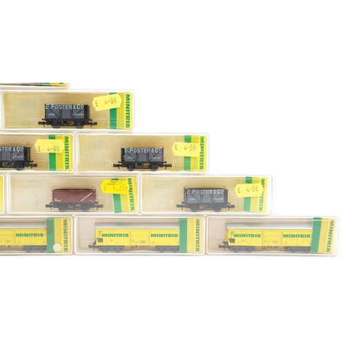 1540 - Fifteen Minitrix N gauge model railway wagons and containers with cases