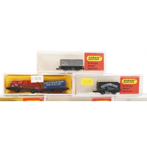 1538 - Fifteen Hornby Minitrix N gauge model railway wagons with cases