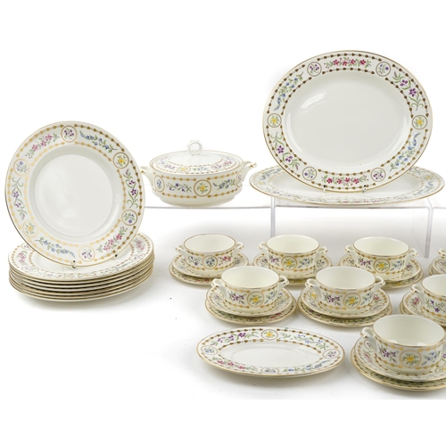 1084 - Royal Worcester Trianon dinnerware including two lidded tureens, oval platters and dinner plates, th... 