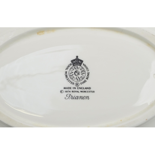 1084 - Royal Worcester Trianon dinnerware including two lidded tureens, oval platters and dinner plates, th... 