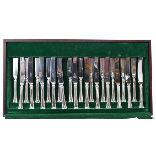 1087 - Cooper Bros mahogany canteen of Sheffield silver plate and stainless steel cutlery, the canteen, 58.... 