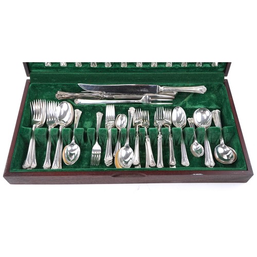 1087 - Cooper Bros mahogany canteen of Sheffield silver plate and stainless steel cutlery, the canteen, 58.... 