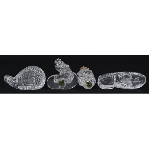 1102 - Waterford Crystal with boxes comprising golf bag, golf shoe, golf putter and golfer, the largest 17c... 