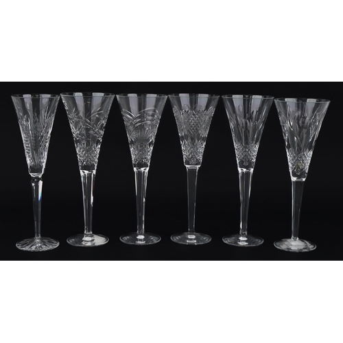 1097 - Six Waterford Crystal toasting flutes housed in celebration boxes, the largest 26cm high