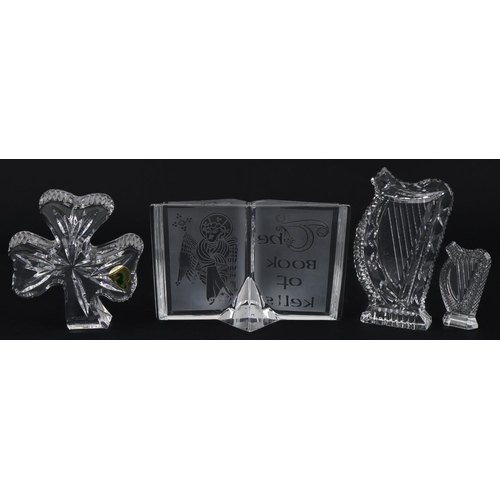 1103 - Waterford Crystal with boxes including five inch shamrock paperweight and Book of Kells, the largest... 