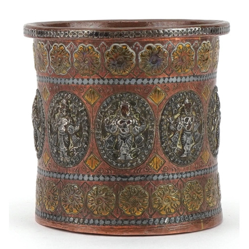 181 - Indian copper vase with applied silver deities and brass flowers, 8cm high