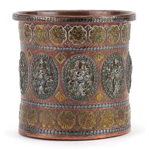 181 - Indian copper vase with applied silver deities and brass flowers, 8cm high