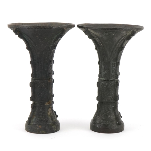 164 - Pair of Chinese patinated bronze Gu archaic style vases, each 18cm high