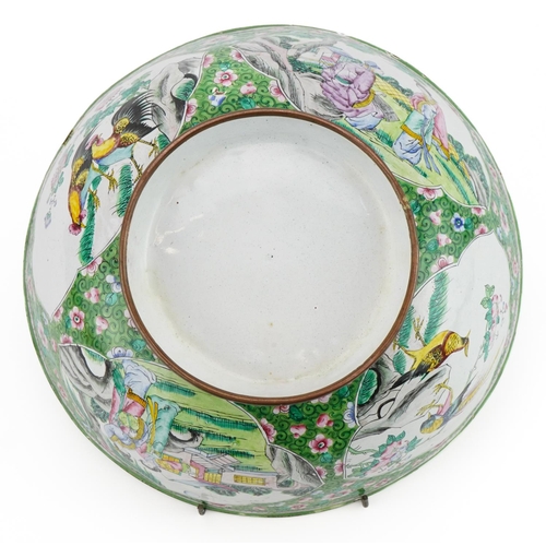 48 - Chinese Canton enamel footed bowl hand painted with panels of figures in a palace setting and birds ... 