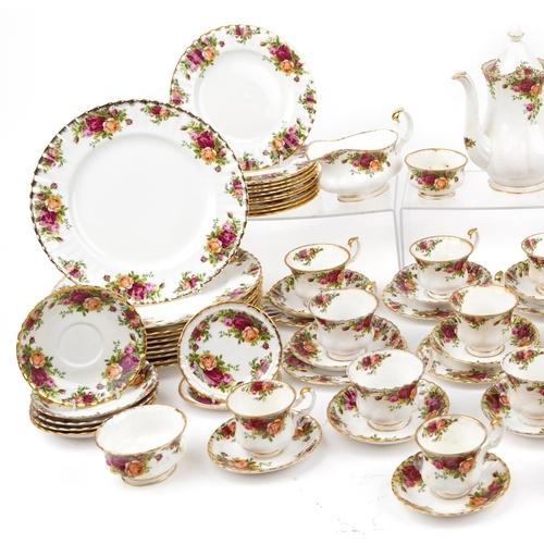 1083 - Royal Albert Old Country Roses dinner and teaware including coffee pot, trios, dinner plates and sau... 