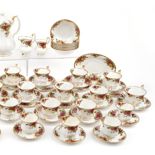 1083 - Royal Albert Old Country Roses dinner and teaware including coffee pot, trios, dinner plates and sau... 