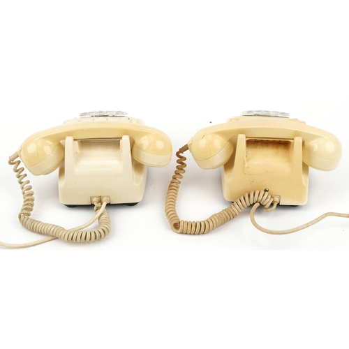 1384 - Two vintage cream dial telephones, one stamped GPO